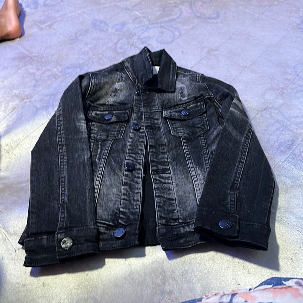 A black Denim jean jacket with Matching black Denim jeans set